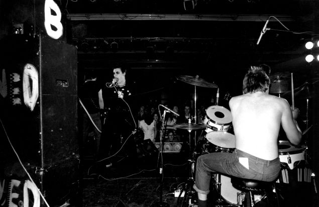 December 6, 1976: The Damned, from left to right Brian James (bass), Dave Vanian (vocals) and Rat Scabies (drums), performing at Leeds Polytechnic, the first date of the 'Anarchy Tour' with the Sex Pistols and Johnny Thunders and the Heartbreakers.