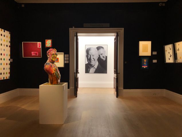 A preview shot of work from the Frank Dunphy collection, including a number by Damien Hirst, on view at Sotheby's auction house.
