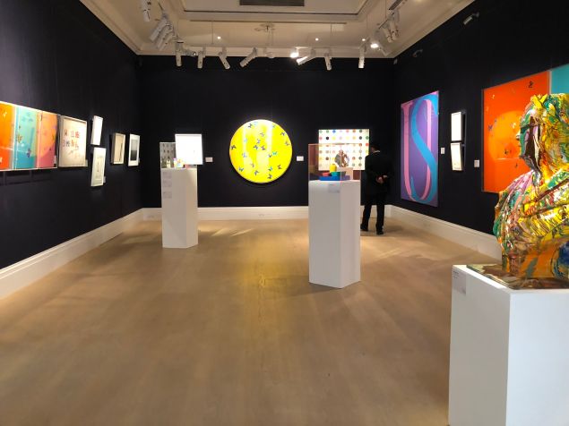 A preview shot of work from the Frank Dunphy collection, including a number by Damien Hirst, on view at Sotheby's auction house.